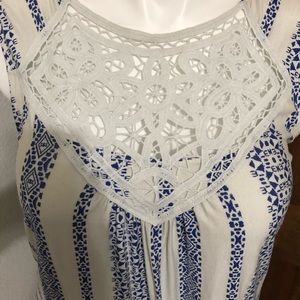 White and blue with lace sleeveless top.